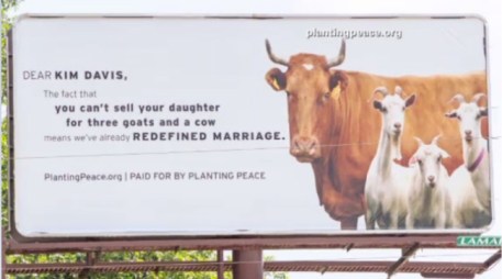 A sign recently erected in Kim Davis' town